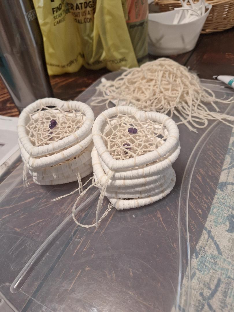 Heart shaped dreamcatchers made for wedding favors for the guest. 